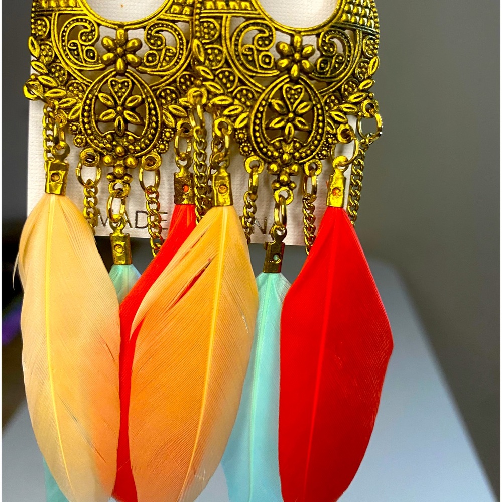 Beautiful light weight multi color feather earrings. Made in India.